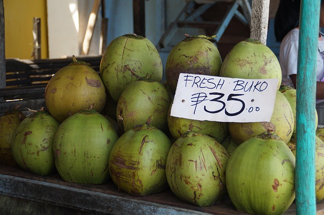 Fresh buko coconut at local stall in Coron town Palawan Philippines