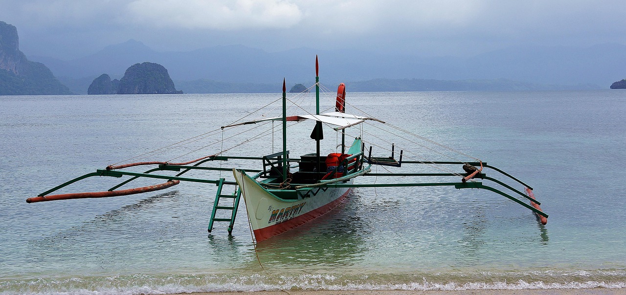 Traditional fishing boat El Nido Palawan Philippines hidden beach area