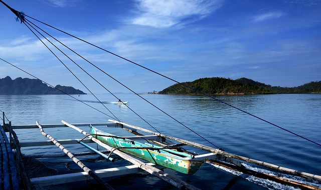 Boat trip on turquoise sea getting to Coron Palawan Philippines