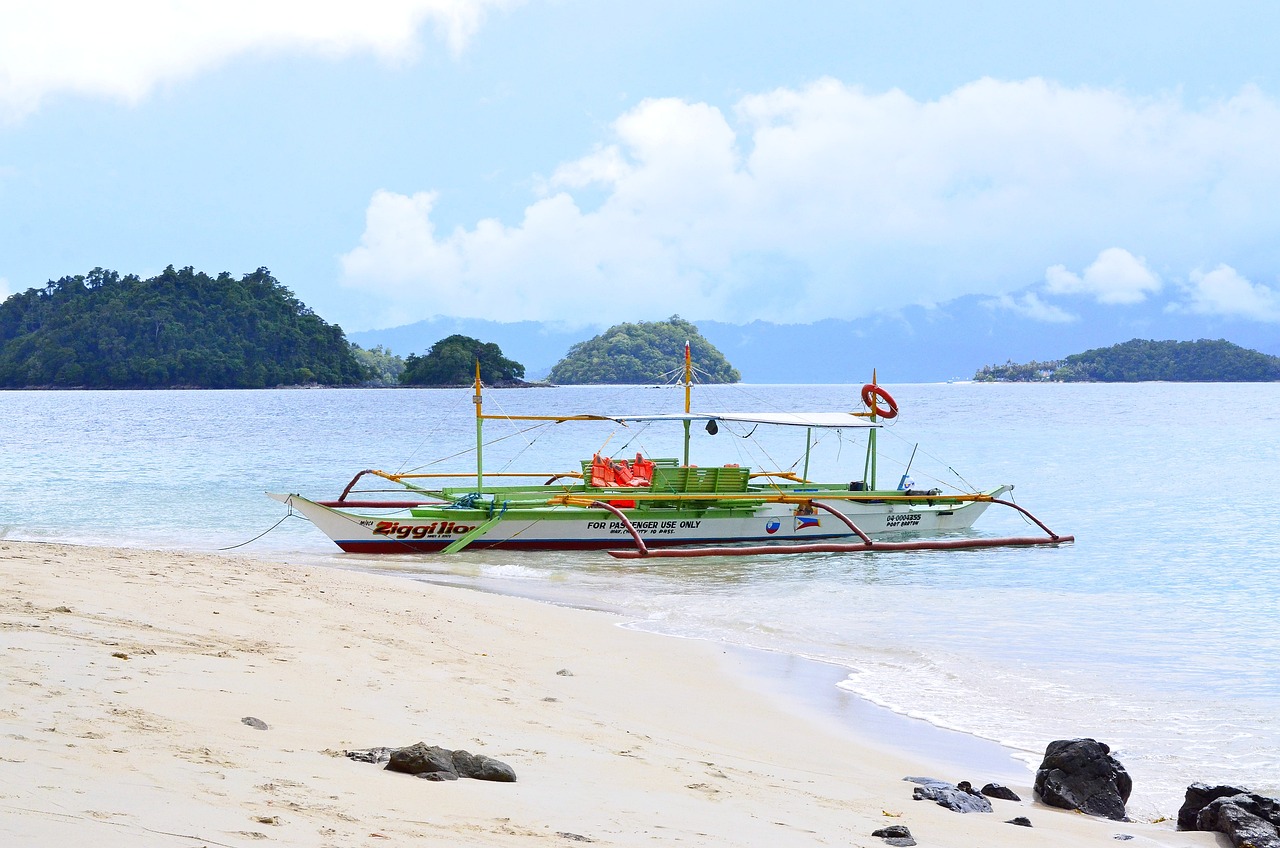 Bangka boat on crystal water in Palawan Philippines perfect for solo travel island hopping tours