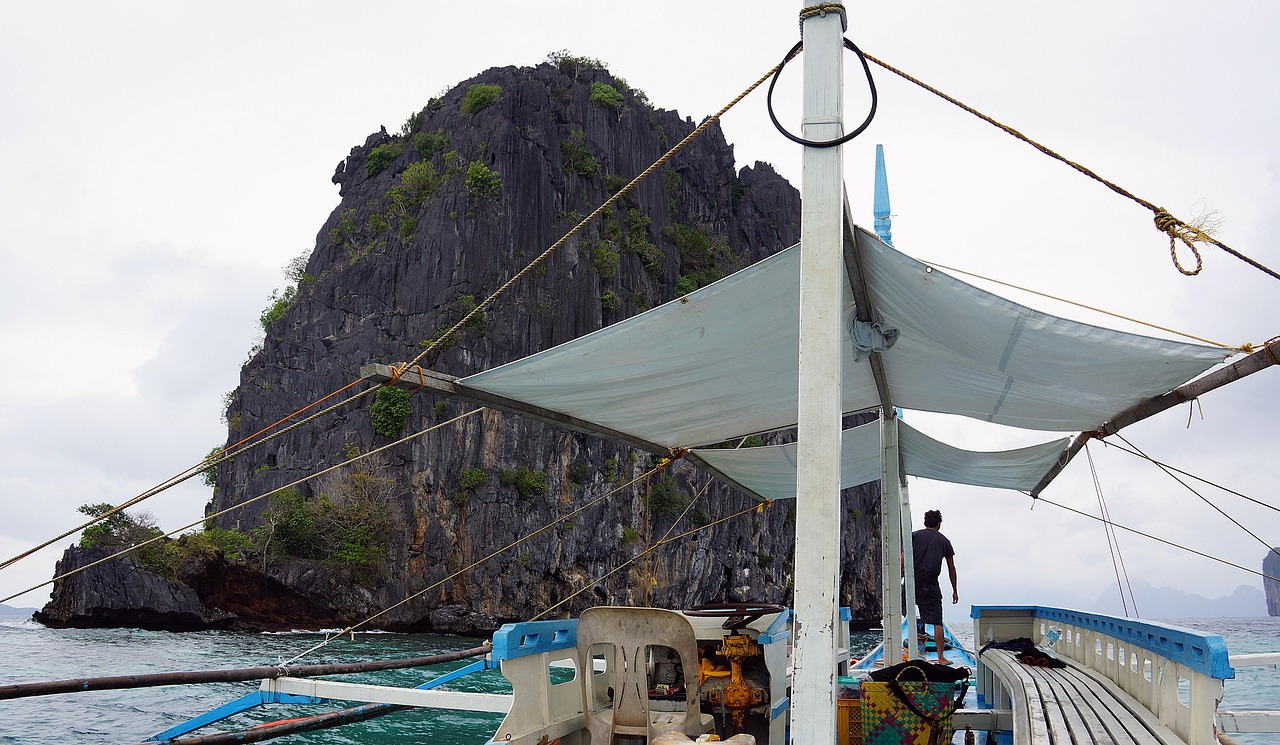 Nacpan Beach El Nido Palawan Philippines limestone cliffs and white sand
