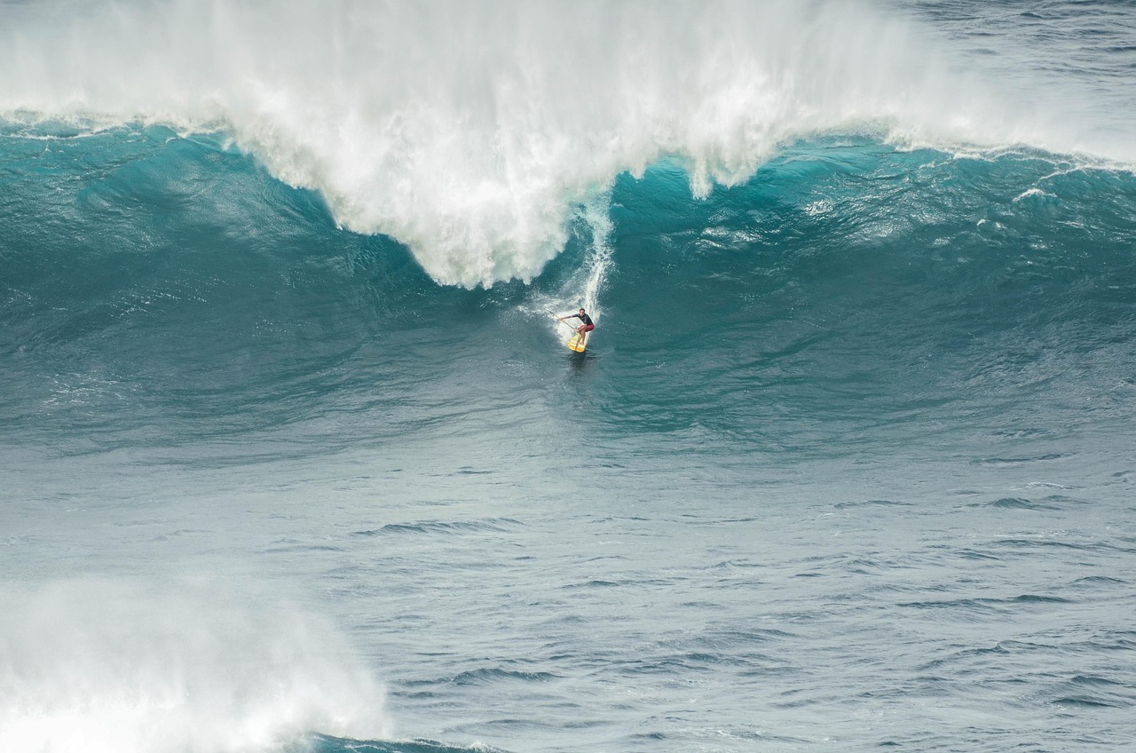 Surfer riding waves in Siargao Philippines surfing destination