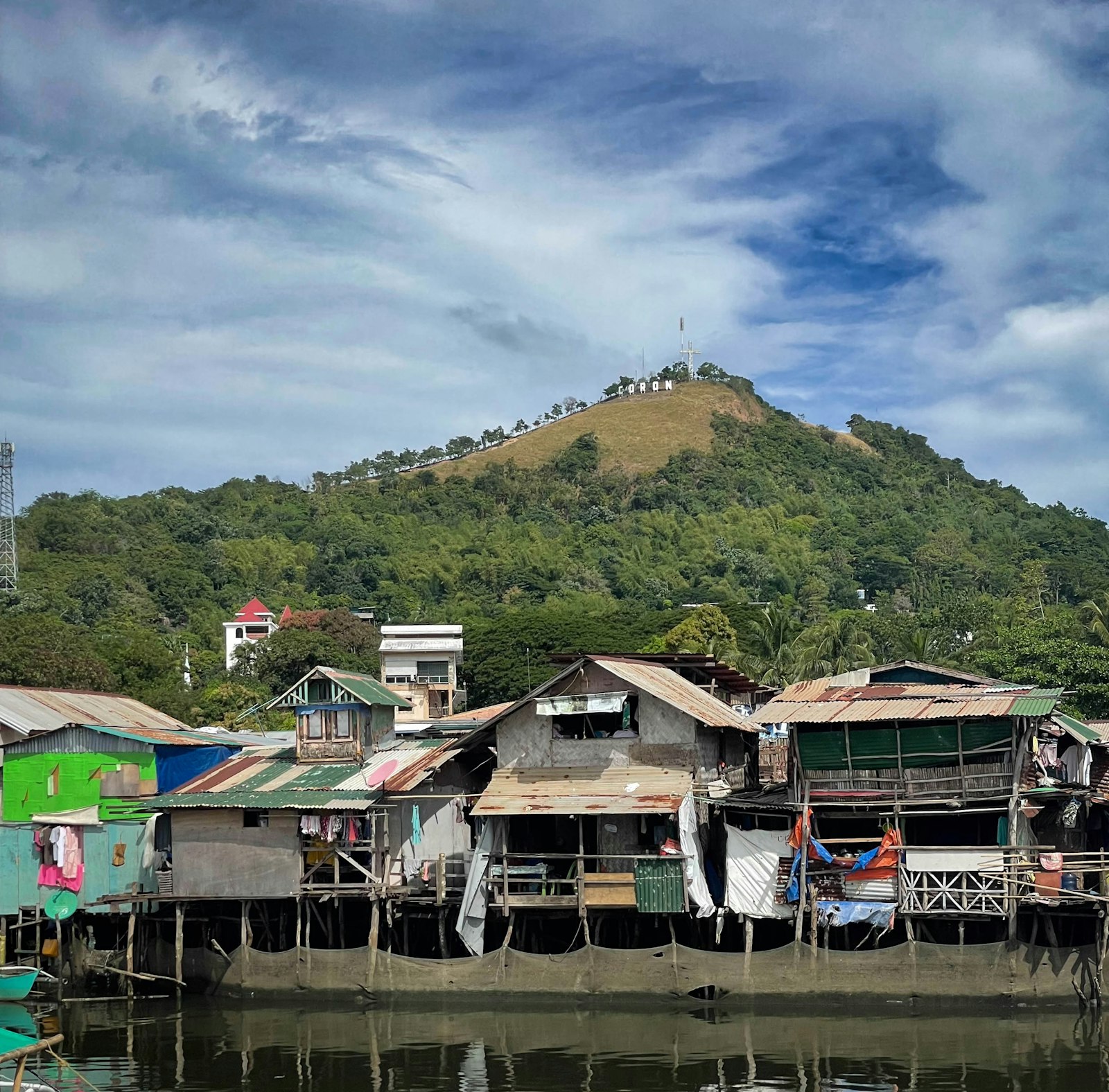 Coron town stilt houses with Mount Tapyas hill in the background Palawan Philippines