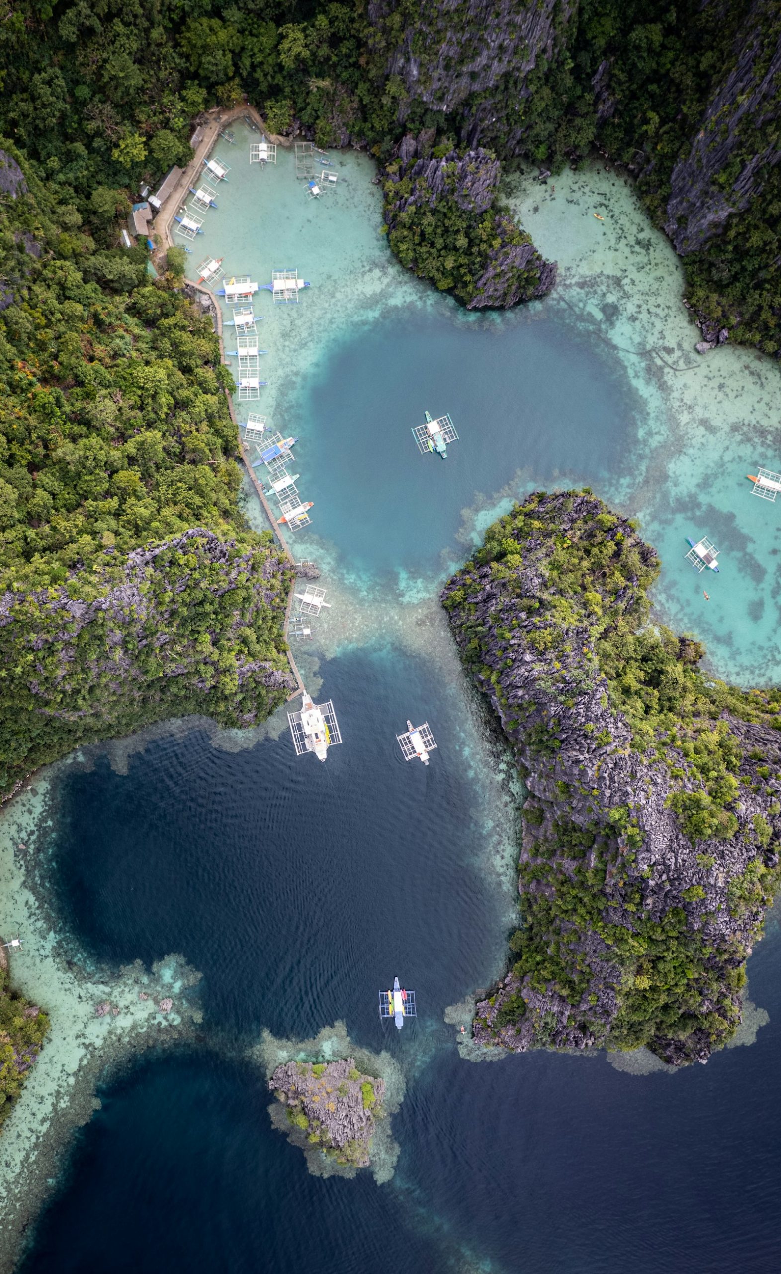 Aerial view of Twin Lagoon Coron Palawan with bangka boats