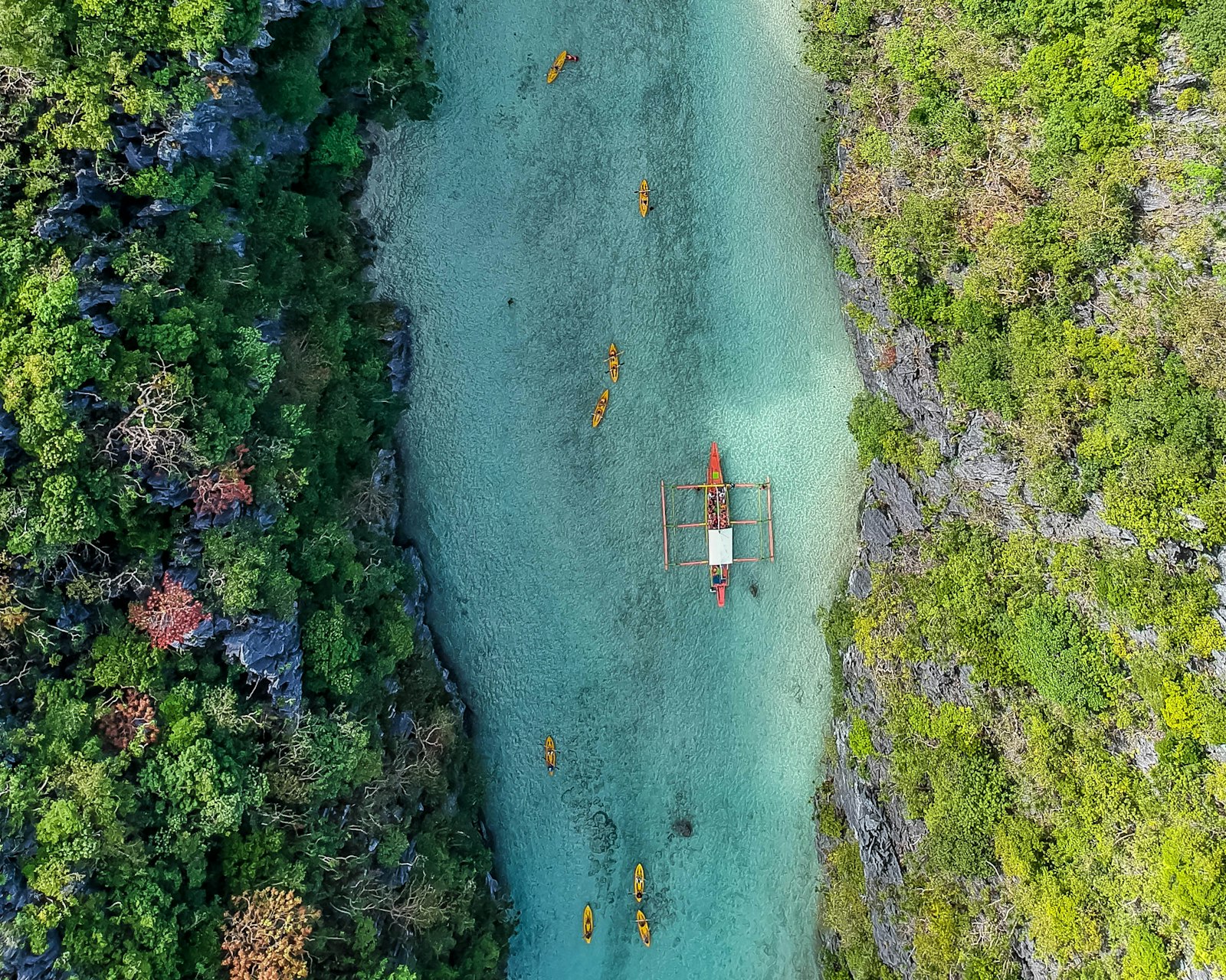 Boat in a lagoon in El Nido, Palawan, near a marine sanctuary where reef-safe sunscreen checks happen