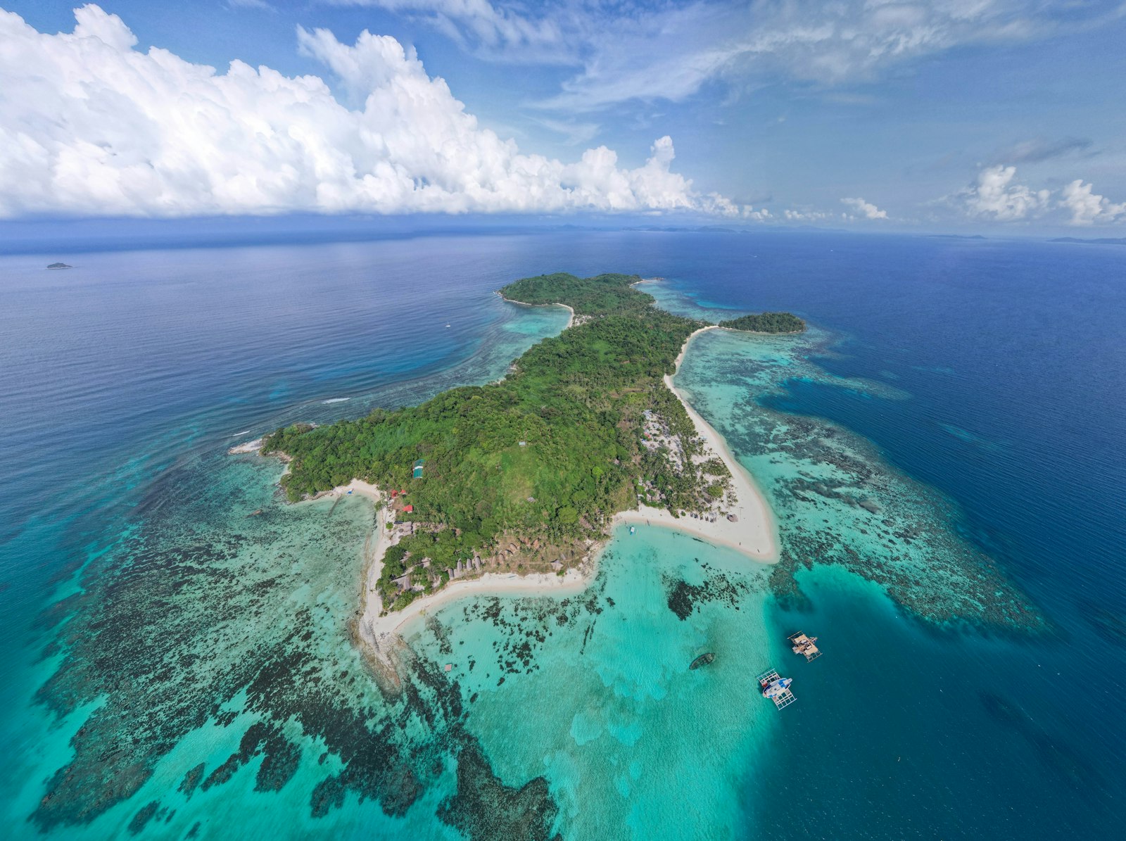 Aerial view of a coral reef and turquoise water in El Nido, Palawan, where reef-safe sunscreen matters most