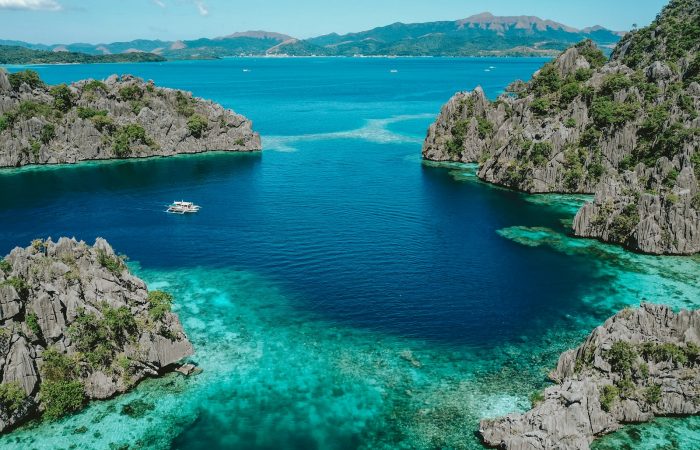 Aerial view of turquoise water and limestone cliffs in Coron, Palawan, near Twin Lagoon