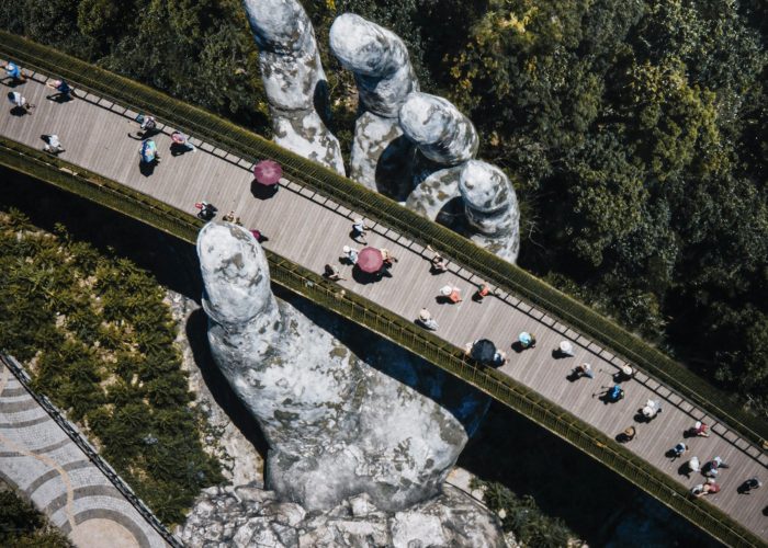 Golden Bridge held up by giant stone hands at Ba Na Hills, Da Nang