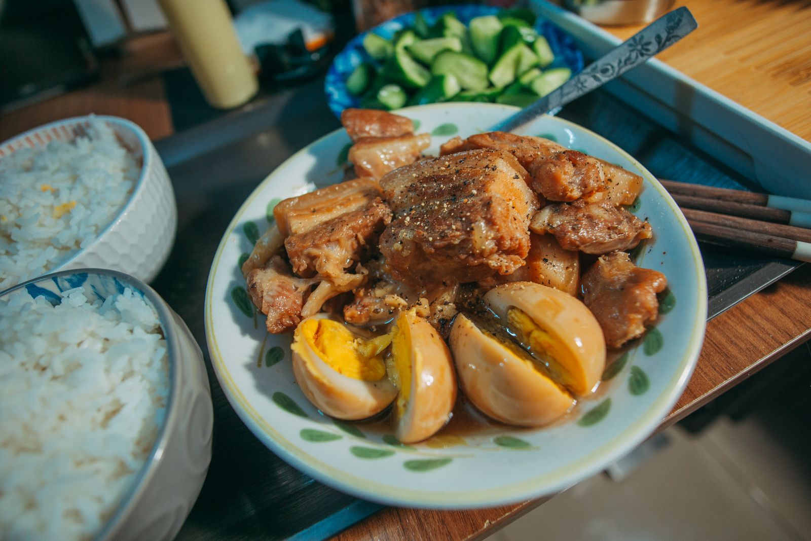 Filipino pork adobo with rice, the kind of cheap carinderia meal that keeps an El Nido budget per day low