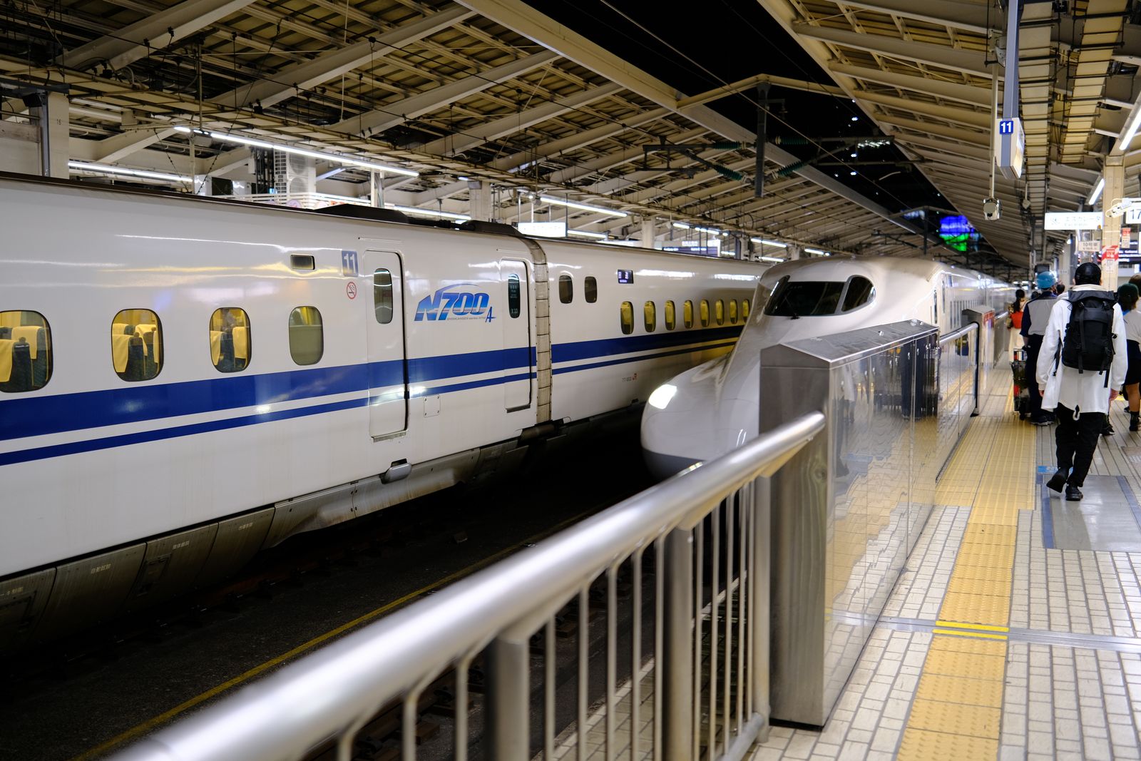 Shinkansen bullet train at a Tokyo station platform, a major part of any Japan trip cost from the Philippines