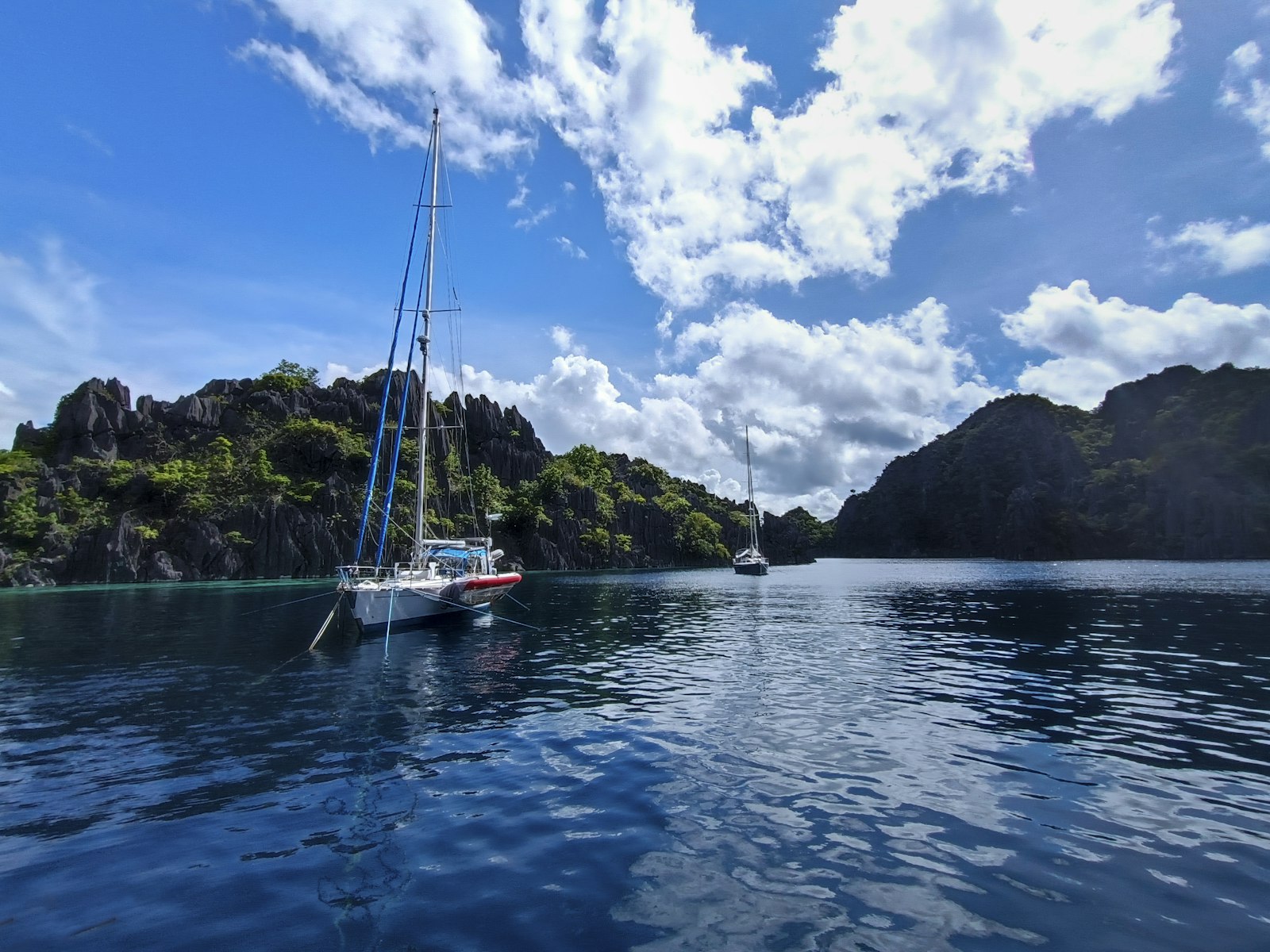 Boat crossing open water in Coron on a Palawan ferry route in Palawan Philippines
