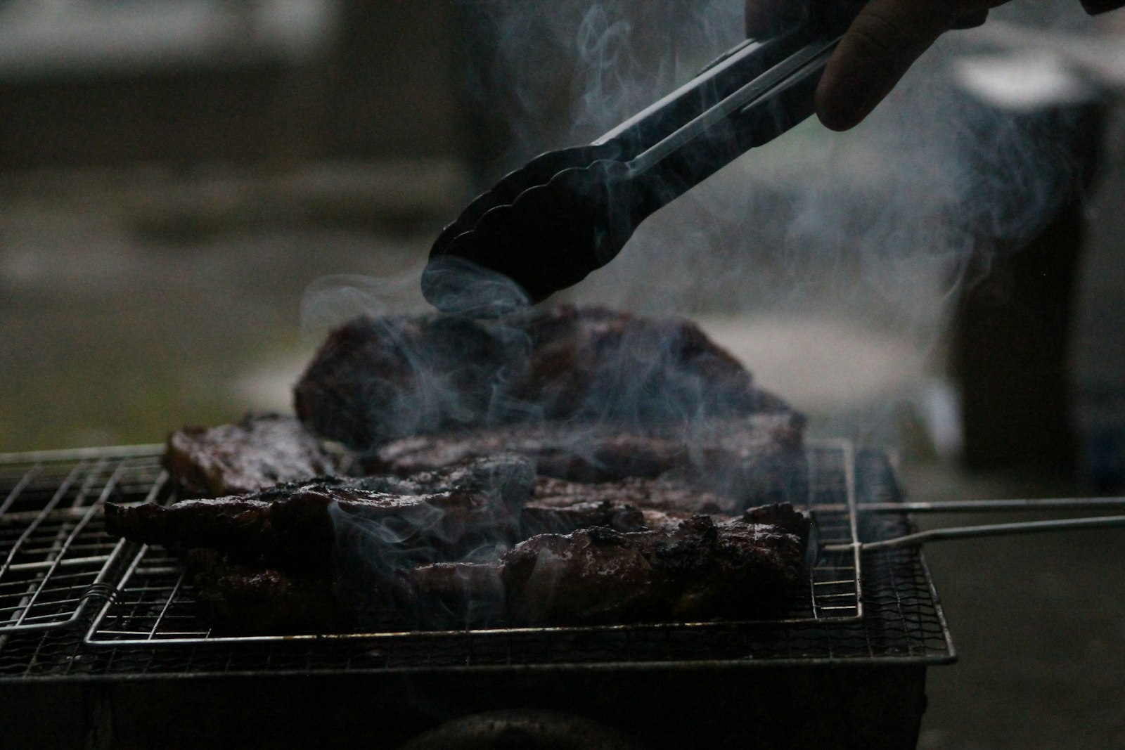 Charcoal grill cooking Filipino barbecue, the method behind most Port Barton restaurants seafood dishes