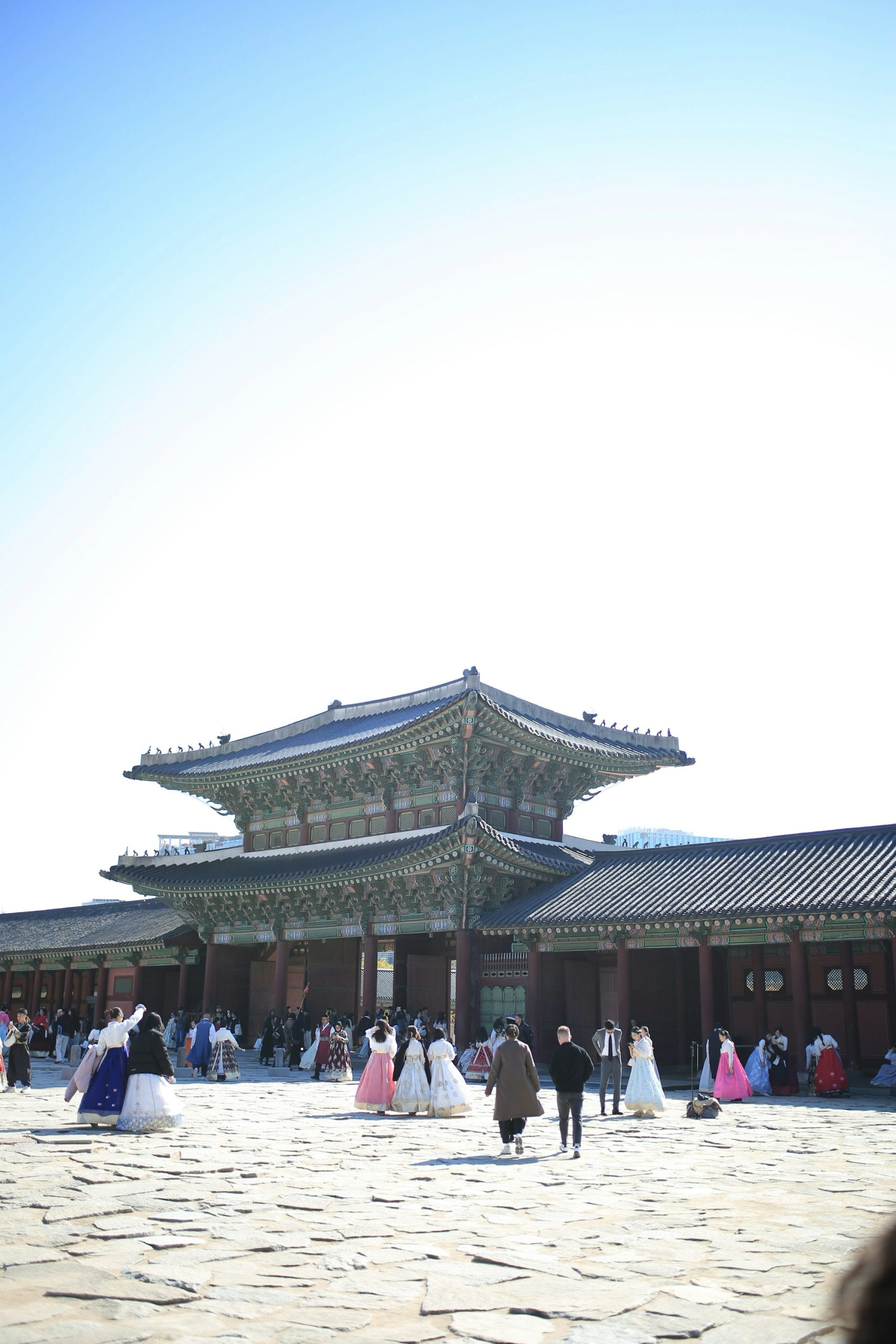 Visitors in hanbok at Gyeongbokgung Palace, a must-see in this South Korea travel guide for Filipinos