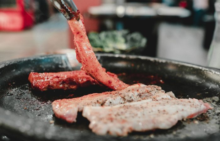 Korean barbecue grilling at the table, a key line in any South Korea trip cost from the Philippines