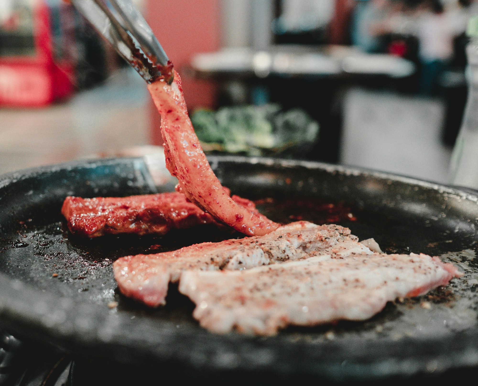 Korean barbecue grilling at the table, a key line in any South Korea trip cost from the Philippines